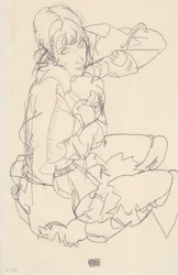 Fille assise